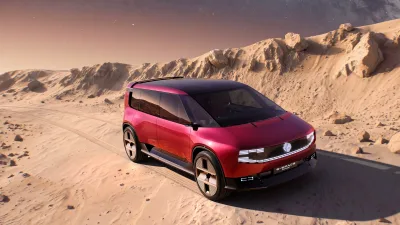 Renault E-Space Concept rouge vu de trois quarts avant dans un décor désertique